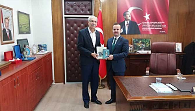 Eski Başkan Özkaraman ve ekibinden Kaymakam’a Ziyaret 