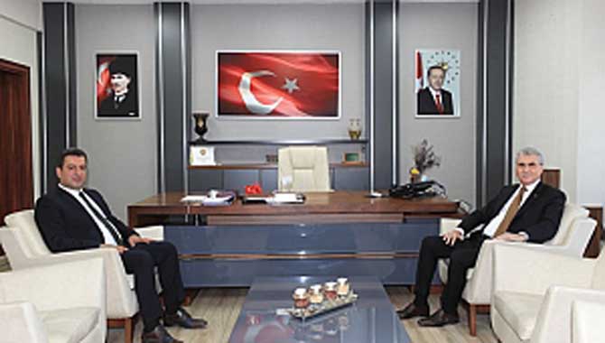 Başkan Ekrem Yüce, Milli Eğitim Müdürü Savaşçı’yı ziyaret etti